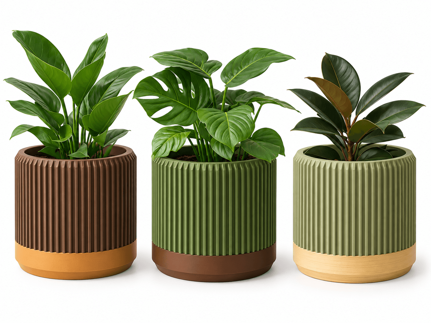 Three ribbed modern planter pots in earthy colours with green indoor plants