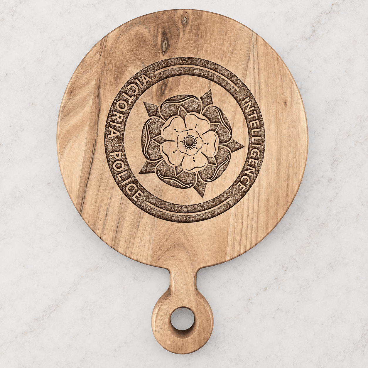 Laser engraved wooden serving board with a personalised decorative design